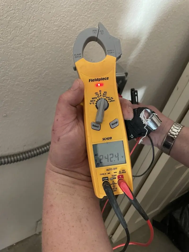 Voltage testing with clamp meter during Generator Installation in Viera East